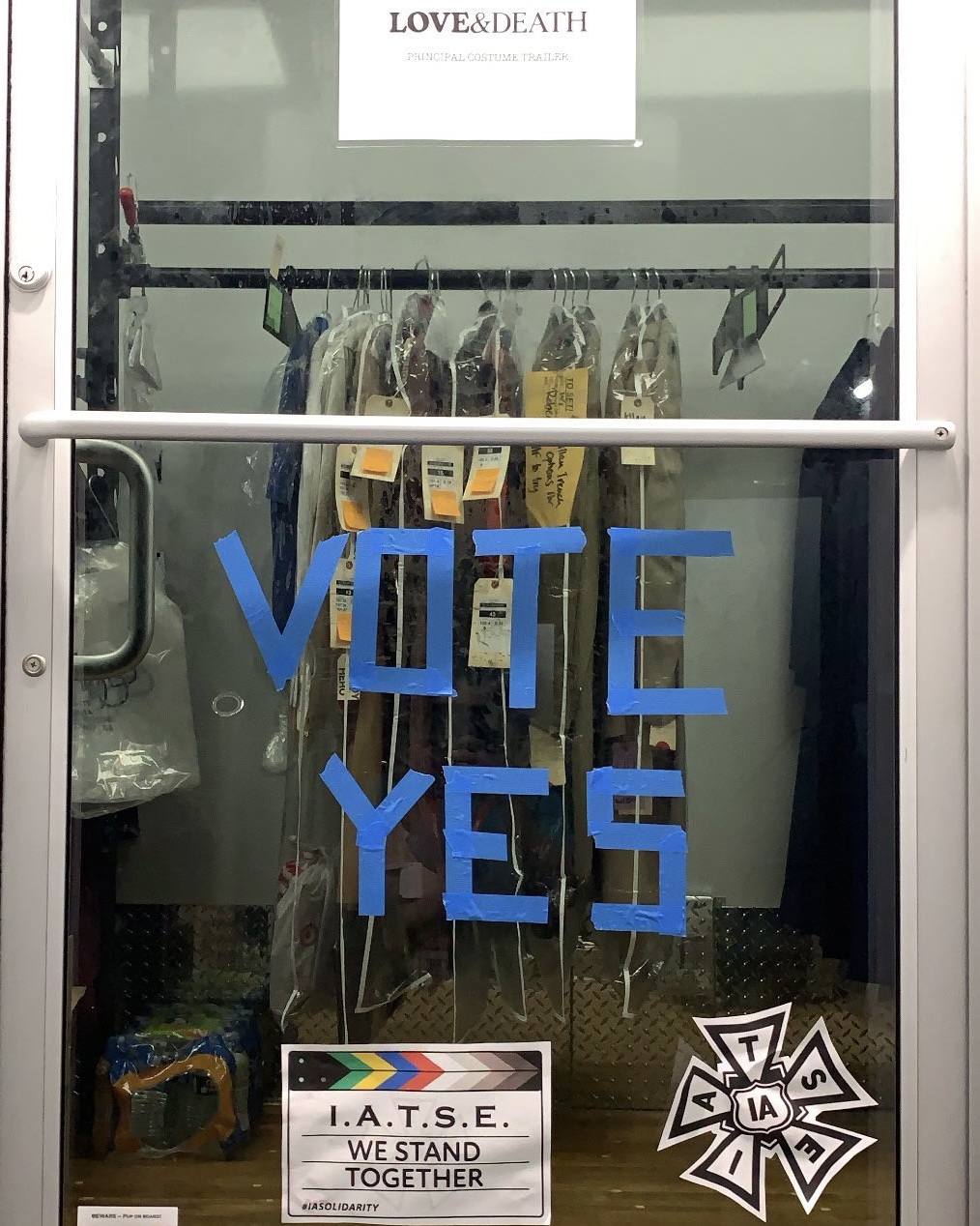 Door to the costume truck on the show Love & Death with IATSE stickers and Vote Yes written on it.