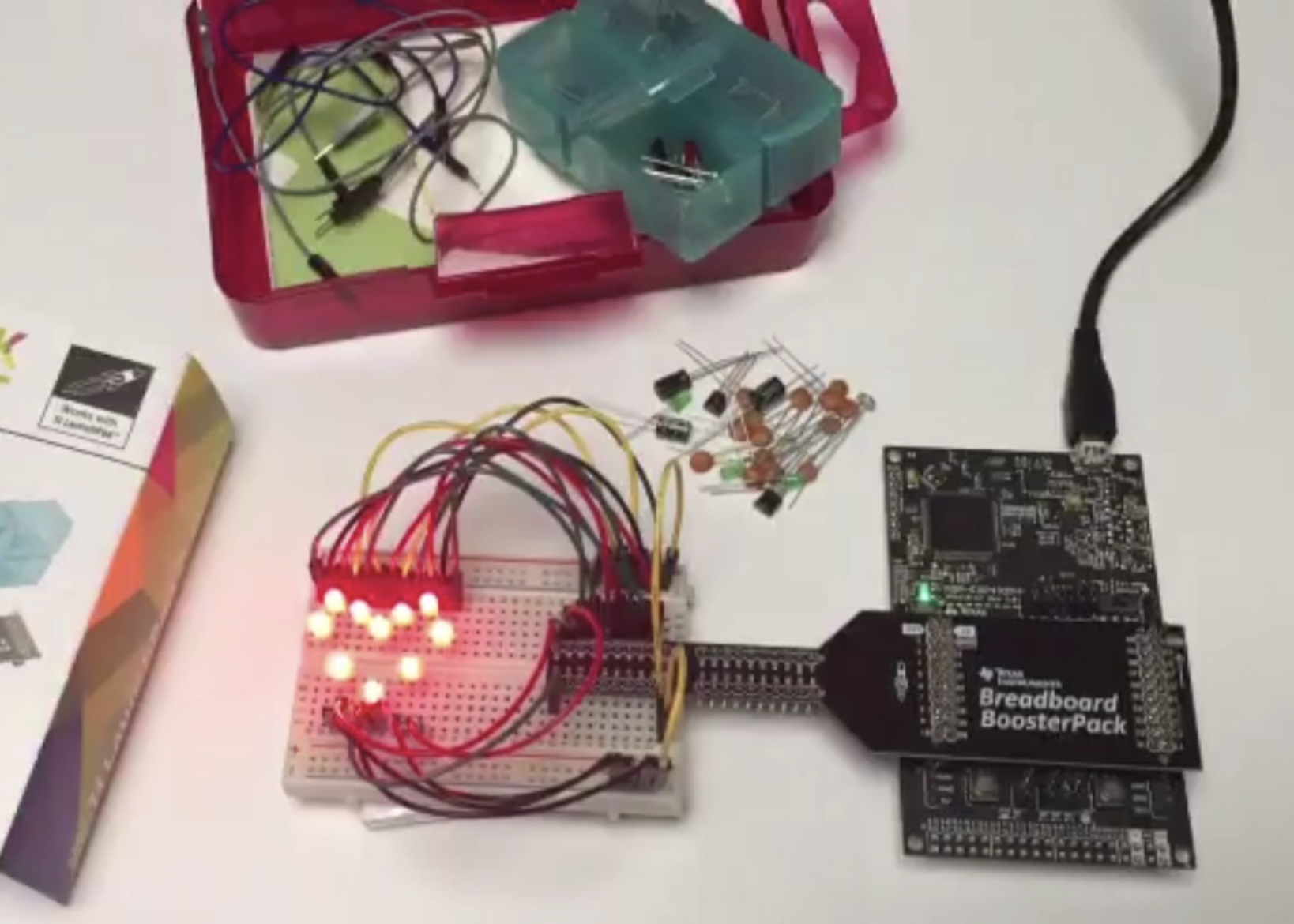 LEDs on a breadboard in the shape of a heart.